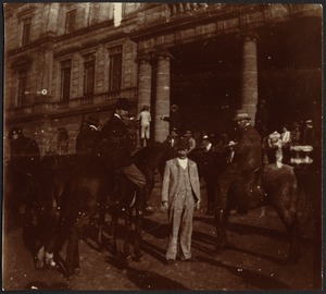Soldiers on horseback and crowd of people standing in front of Council Chamber