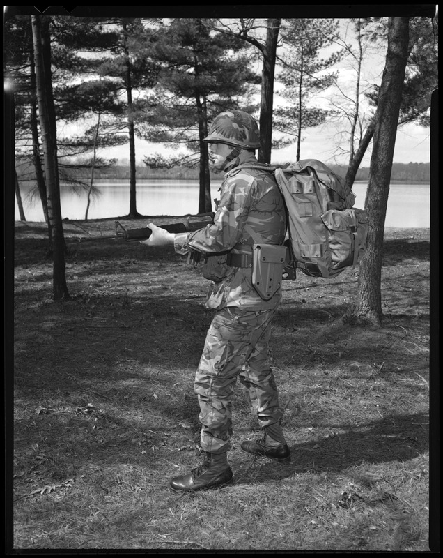 IO, G.I. wearing camouflage uniform