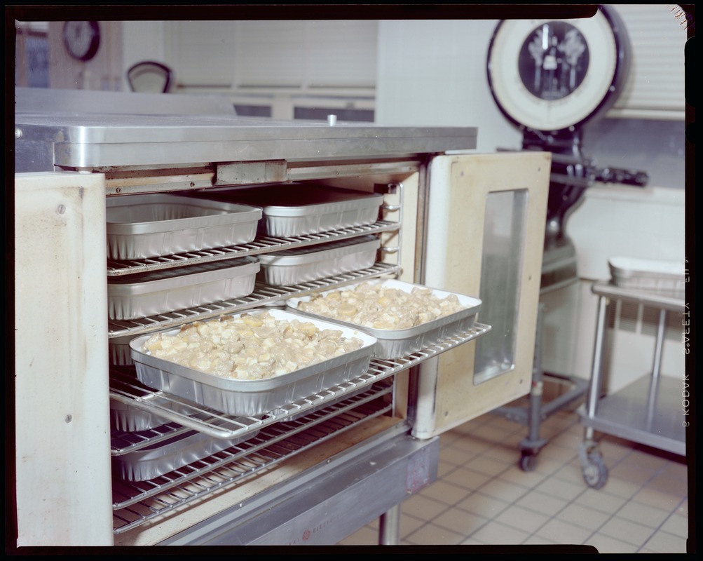 Food packaging div., 15 containers in oven heating Digital Commonwealth