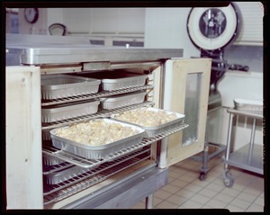 Food packaging div., 15 containers in oven heating