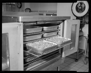 Food packaging div., 15 containers in oven heating