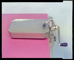 Food packaging div., institutional can opener with tray in place