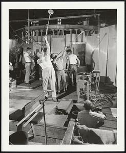 For Modern Research-Here at the Vineland N. J. plant of the Kimble Glass Co., a subsidiary of Owens-Illinois, workers blow special glassware for laboratory use. Scientists call laboratory glassware "pots and pans."