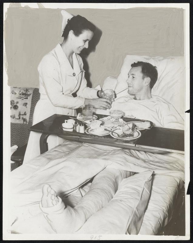 John "Blondy" Ryan, one of Lynn's better contributions to professional baseball, is shown in a hospital bed at Rochester, N. Y. The breaks went against Blondy fast, first being sent to the minors by the New York Giants and then breaking his leg. The nurse is Georgiana Athey, but if Ryan is as fast in thought as in the past he'll probably be calling her "Athey baby."