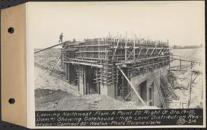 Contract No. 80, High Level Distribution Reservoir, Weston, looking northwest from a point 20 feet right of Sta. 19+80, dam 1 showing gatehouse, high level distribution reservoir, Weston, Mass., Apr. 30, 1940