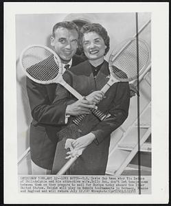 Love Match--U.S. Davis Cup team star Vic Seixas of Philadelphia and his attractive wife, Dolly Ann, don't let tennis come between them as they prepare to sail for Europe today aboard the liner United States. Seixas will play in tennis tournaments in Germany, France and England and will return July 12.