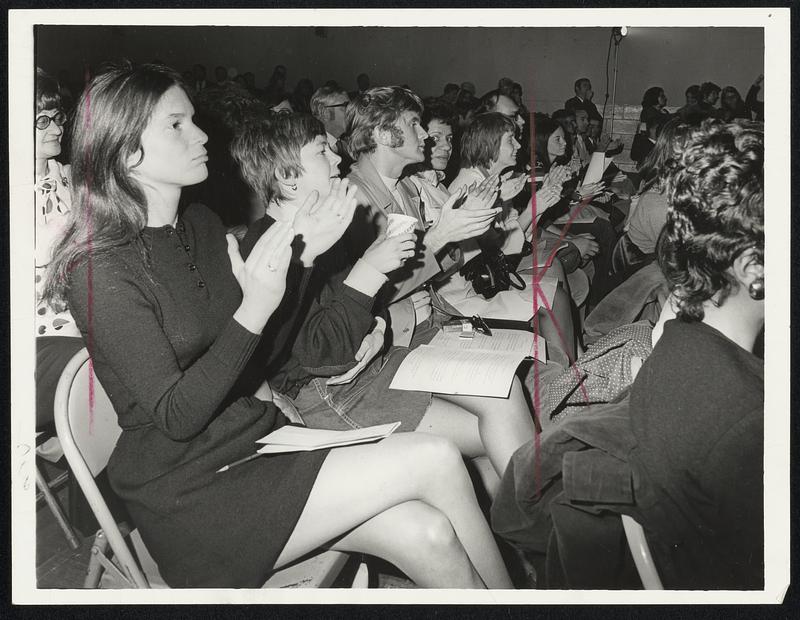 Boston teachers register support of strike at a rally in Florian Hall, Dorchester.