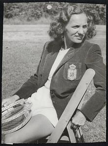 No English, But, O My! What Tennis!-She's Mrs. Magda Rurac, the national tennis queen of Roumania, currently one of the quarter-finalists in the tournament at Essex. She doesn't speak English but her tennis is excellent in any language. Her quarter-final opposition today was Mrs. Virginia Wolfenden Kovacs of San Francisco.