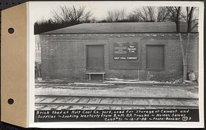 Contract No. 71, WPA Sewer Construction, Holden, brick shed at Holt Coal Co. yard used for storage of cement and supplies, looking westerly from Boston and Maine Railroad tracks, Holden Sewer, Holden, Mass., Dec. 5, 1939