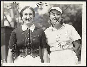 Keeping A Stiff Upper Lip are Valerie Scott of England (left), singles finalist, and her semi-final victim, Mme. Simone Mathieu of France as their thoughts turn toward Europe while trying to fill out their tennis schedule on foreign shores. Mme. Mathieu's children await her return to France.