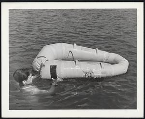 As a result of a new combination of cement and synthetic rubber patch developed by The Firestone Tire & Rubber Company, the repair of punctured life rafts can be accomplished in 1-1/2 minutes. The cement and patch are effective In fresh and salt water. With the raft rapidly deflating as a result of a rip in its side, an aviator, forced down in the ocean, can slide overboard and apply cement and patch. This new method is expected to save the lives of many U. S. airmen.