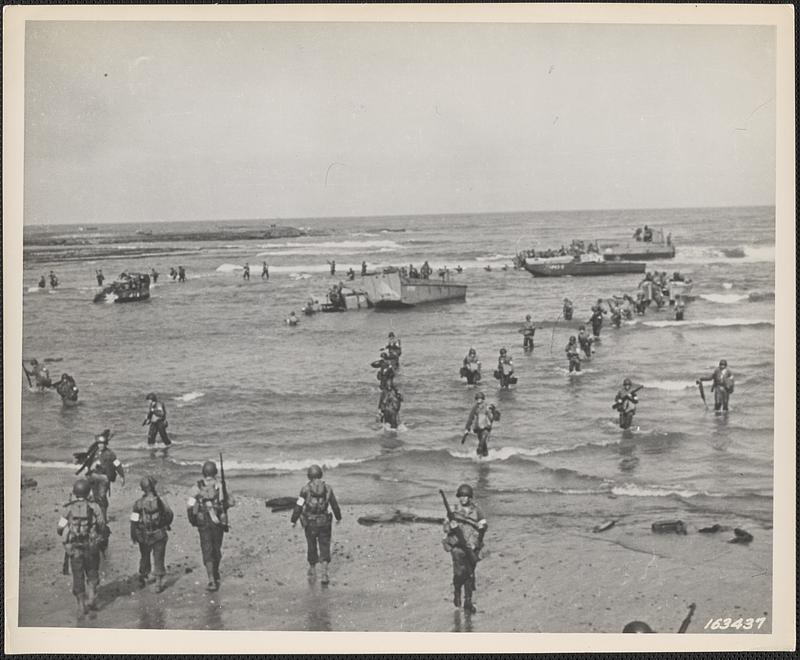 U.S. troops landing with Higgins assault boats on a beach in French Morocco