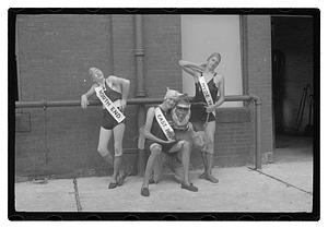 Three men posing wearing sashes, Boston Park Department Circus entertainers