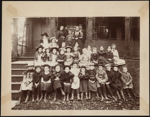 Miss Kate Carroll, staff and children in front of 78 Temple Street school
