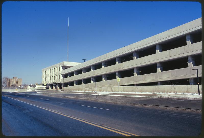 Part of series on Mass. Transit - new Quincy Rapid Transit line to Boston showing parking garage