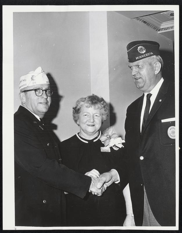 Commander greeted--National Commander Daniel F. Foley of the American Legion (right) is greeted by Thomas E. Abely, of Canton State Department commander, and Mrs. Mary Jezzk of Cheshire, state Ladies Auxiliary department head. Foley was guest of State Department at Statler-Hilton reception.