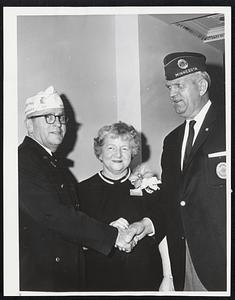 Commander greeted--National Commander Daniel F. Foley of the American Legion (right) is greeted by Thomas E. Abely, of Canton State Department commander, and Mrs. Mary Jezzk of Cheshire, state Ladies Auxiliary department head. Foley was guest of State Department at Statler-Hilton reception.