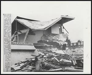 Ravages of the Wind and Sea--An apartment house stands smashed, a mute souvenir of Hurricane Dora that roared through this coastal residential area 17 miles east of Jacksonville last night and today. This building is some 30 feet from the water's edge.