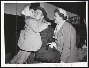 What A Trip, declares Susan Burke, 4 1/2, of Everett, shown here with her parents, Mr. and Mrs. Gilbert Burke. The Burkes were on train from Washington that was more than 20 hours overdue when it arrived yesterday afternoon. The trip didn’t bother Susan. She slept most of the way.