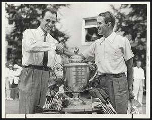 “Little Poison” Paul Runyan (right) of White Plains, N. Y., played 196 holes in the National P. G. A. championship at Shawnee-on-Delaware and defeated Slugging Sam Snead (left) of White Sulphur Springs, West Va., by the spacious score of 8 and 7 in the final yesterday to get this trophy; and now that he has it, he seems to be wondering what to do with it. It’s too big to drink from, and just a trifle too small to take a bath in, but he was aware of the consequences of winning the thing, because he did once before, in 1934. Runyan succeeds Denny Shute of Brea Burn as possessor of the jug.