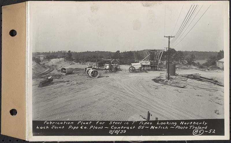 Contract No. 85, Manufacture and Delivery of Precast Concrete Steel Cylinder Pipe, Southborough, Framingham, Wayland, Natick, Weston, fabrication plant for steel 7 in. pipes, looking northerly, Natick, Mass., Aug. 8, 1939