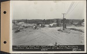 Contract No. 85, Manufacture and Delivery of Precast Concrete Steel Cylinder Pipe, Southborough, Framingham, Wayland, Natick, Weston, fabrication plant for steel 7 in. pipes, looking northerly, Natick, Mass., Aug. 8, 1939