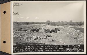 Contract No. 80, High Level Distribution Reservoir, Weston, looking northeast from a point 50 feet+/- north of Sta. 97+/- showing dam 5, Access Road and parking area, high level distribution reservoir, Weston, Mass., May 29, 1940