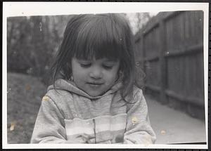 Closeup of girl wearing a sweatshirt