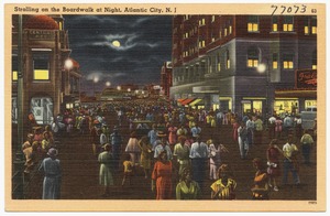 Strolling on the boardwalk at night, Atlantic City, N.J.