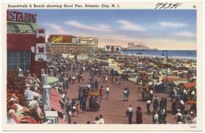 Boardwalk & beach showing Steel Pier, Atlantic City, N.J.