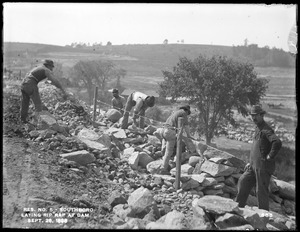 Sudbury Reservoir, laying riprap on north end of Sudbury Dam, from the north, Southborough, Mass., Sep. 26, 1896