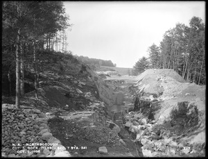 Wachusett Aqueduct, trench and piles of stone, station 341, Section 7, from the south, Northborough, Mass., Oct. 9, 1896