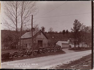 Relocation Central Massachusetts Railroad, Ivers H. Sawyer's house and barn, looking westerly, from electric Railroad track, Berlin, Mass., May 14, 1902