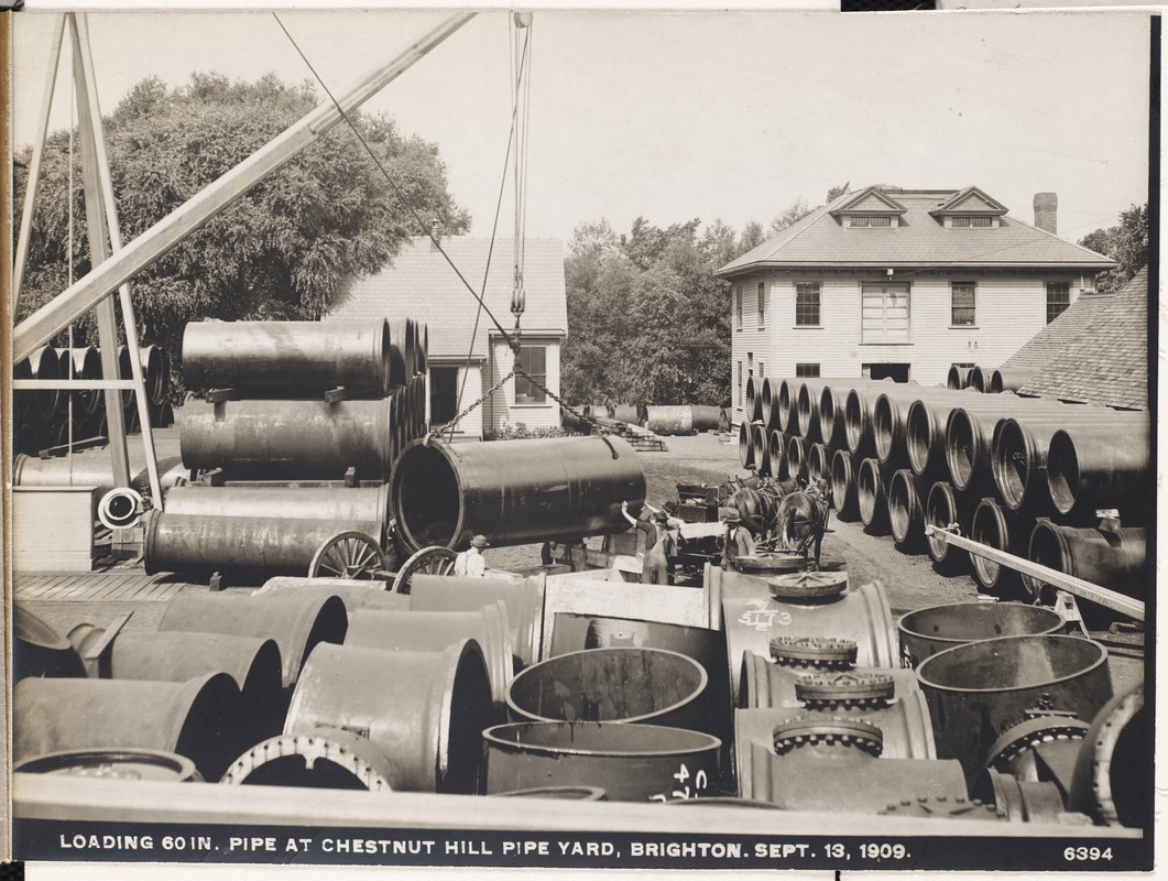 Distribution Department, Chestnut Hill Pipe Yard, loading 60-inch pipe, Brighton, Mass., Sep. 13, 1909