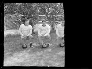 Football players kneeling