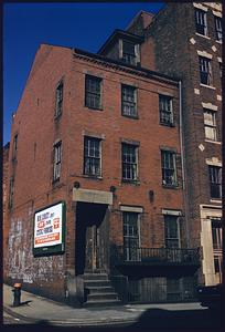 Exterior of brick building on city street corner, Boston