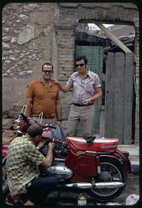 Men with motorcycle, Athens, Greece