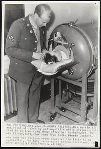 Woman Rallies -- Mrs. Marvin Wilson, right, stricken by poliomyelitis while pregnant, rallied in an iron lung today after her husband, Cpl . Marvin Wilson, left, flew home from India. Doctors, who once had forlern hopes, expected the birth to be successful. The baby is expected before Christmas.
