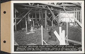 Contract No. 107, Quabbin Hill Recreation Buildings and Road, Ware, looking westerly inside shelter of utility building, showing staging and masonry, tower in background, Ware, Mass., Dec. 13, 1940