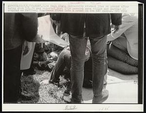 A Kent State University student lies on ground after being shot 5/4.It was reported that four persons were killed and another 15 wounded as National Guardsmen fired into a crowd on the KS campus.