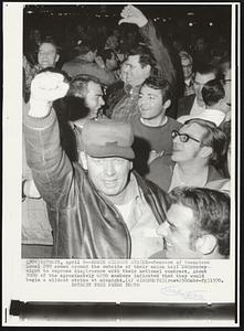 Begin Wildcat Strike -- Members of Teamsters Local 299 crowd around the outside of their union hall Wednesday night to express displeasure with their national contract. About 3000 of the approximately 6000 members indicated that they would begin a wildcat strike at midnight.