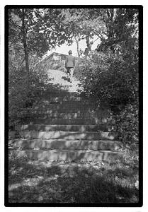 A man walking up stairs