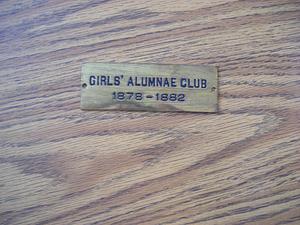 Girls' Alumnae Club metal plaque
