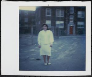 Woman standing in Newtowne Court