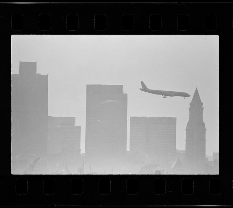 Airliner over downtown (1,000mm lens), downtown Boston