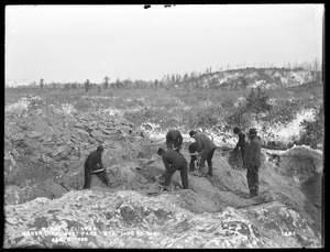 Wachusett Reservoir, North Dike, westerly portion, rock uncovered, between stations 7+50 and 8+00; from the south, Clinton, Mass., Jan. 5, 1898
