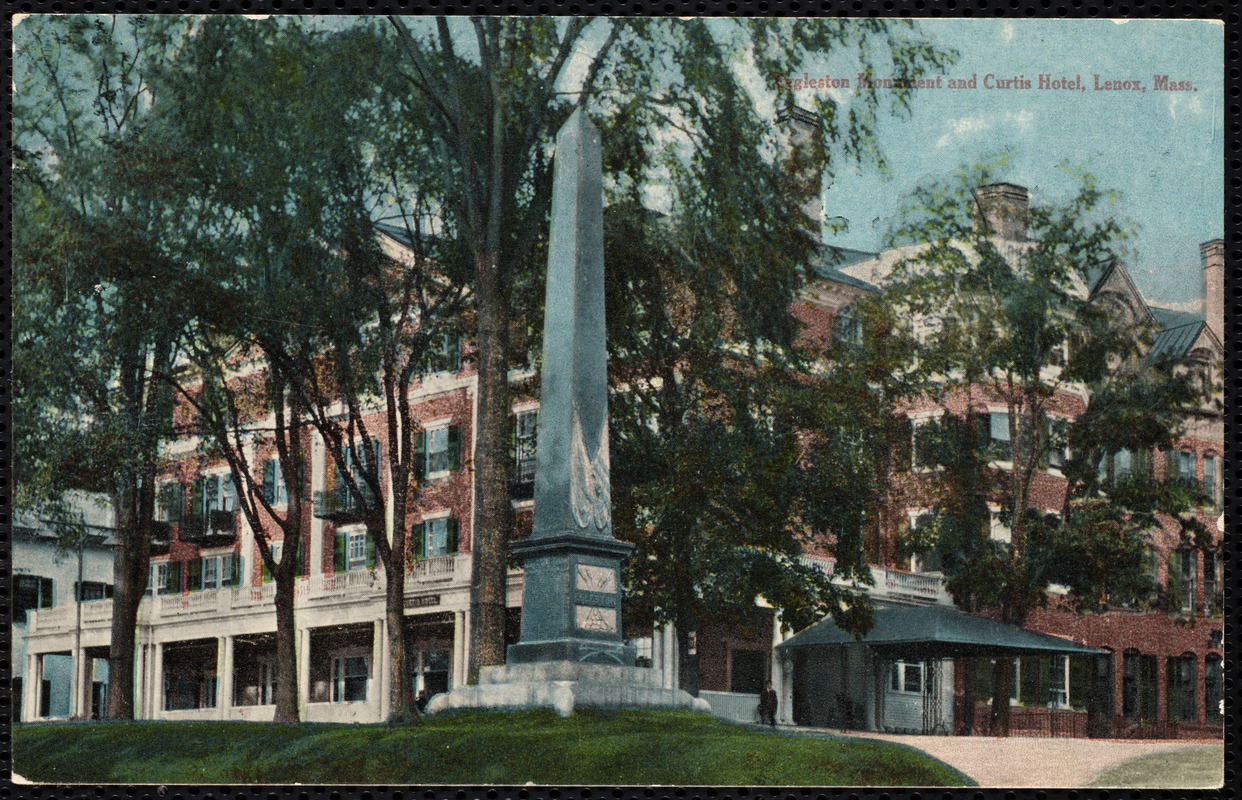 Curtis Hotel: Paterson Monument and Curtis Hotel, shaded by trees.