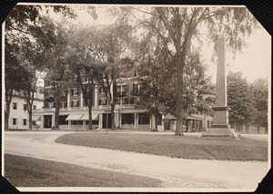 Curtis Hotel: front, trees with leaves, awnings down