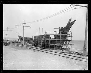 Scaffolding surrounding part of a ship