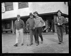Four golfers
